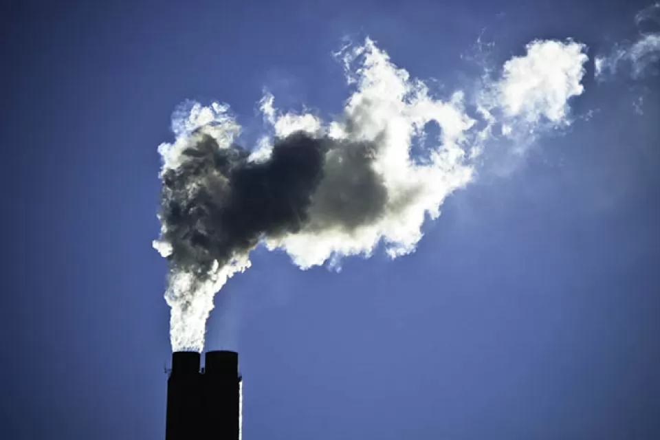 Smokestack with billowing smoke